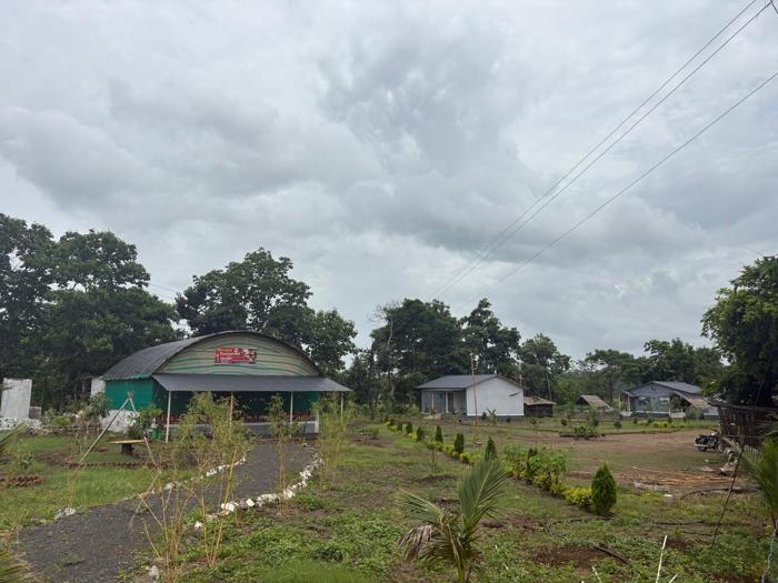 Wide view of the buildings and planted grounds at the Nandai Gate stay.