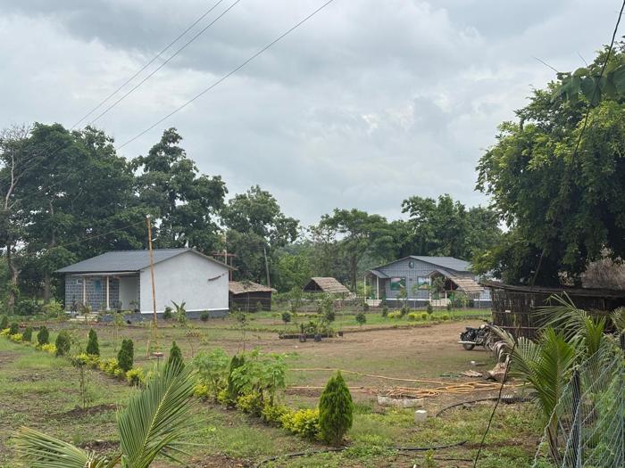 Cottages, garden planting and trees at Maya Stays – Nandai · Mathani Gate.